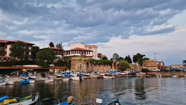 The old town of Nessebar, UNESCO world heritage on the Black Sea coastline, Burgas Region, Bulgaria. Sightseeing view with a mixture of ancient ruins and modern hotel resort on the coast