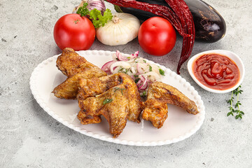 Grilled chicken wings with sauce