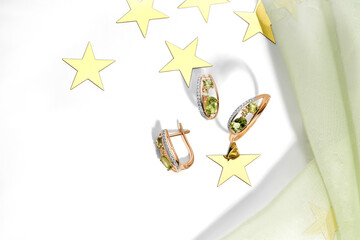 Elegant jewelry set. Jewellery set with gemstones. Product still life concept. Ring, necklace and...