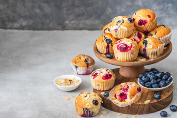 Fresh tasty muffins with berries and almond 