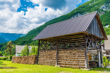 A view along the side of a hay drying frame at the alpine village of Stara Fuzina above lake Bohinj...