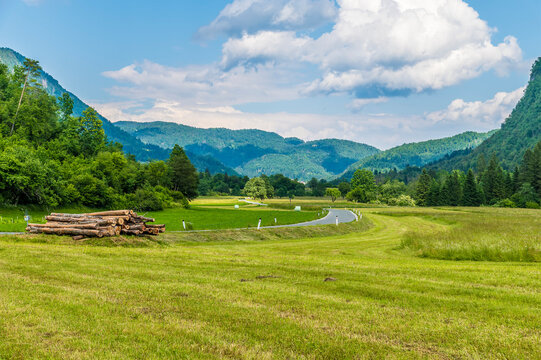 A view of the road leaving the alpine village of Stara Fuzina above lake Bohinj in Slovenia in summertime