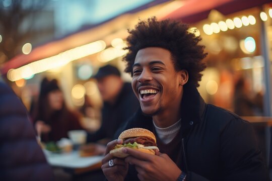 Hungry Young African Model Eating A Burger