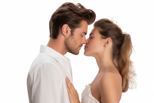 beautiful white european heterosexual couple kissing and looking at each other