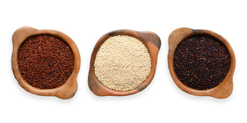 Red, white, and black quinoa in clay bowls. Transparent background. 