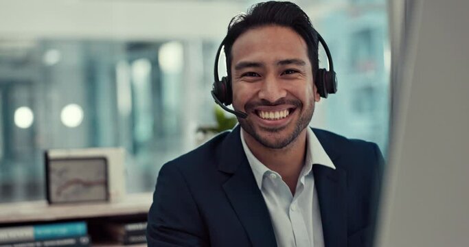 Happy businessman, call center and face in customer service, support or telemarketing at office. Portrait of asian man, consultant or agent smile with headphones in online advice or help at workplace