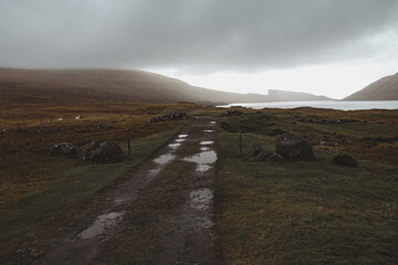 Dirt road near lake Sorvagsvatn, Faroe islands - 635212886