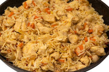 Tasty pilaf with chicken as background.