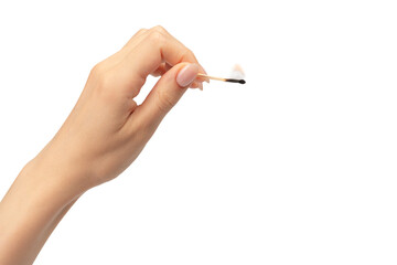 Lit match in a woman hand isolated on a white background.