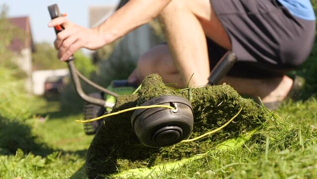 Gasoline Lawn Trimmer Starts Working