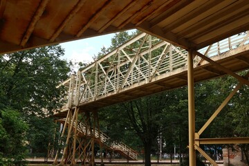 Fototapeta premium Metal footbridge over the tracks at the railway station in Aleksandrow Kujawski.