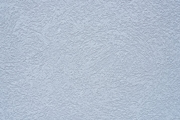 Blue-gray, textured stucco exterior of a building.  Backgrounds. Textures. 