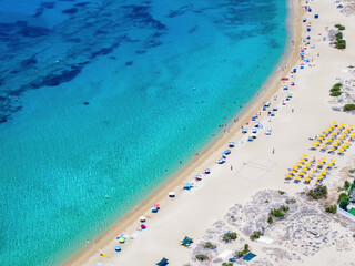 Aerial closeup view of the turquoise shining sea at the beach of Mikri Vigla, Naxos island, Greece