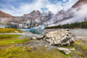 Spectacular autumn view of Oeschinensee Lake.