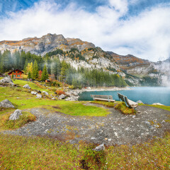 Incredible autumn view of Oeschinensee Lake.