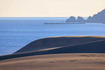 Early morning sun at deserted Tottori Sand Dunes on Sea of Japan coast