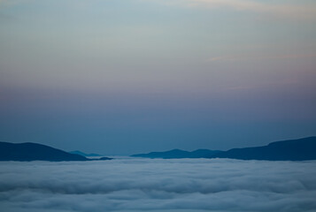 Landscape of mountains under the clouds.