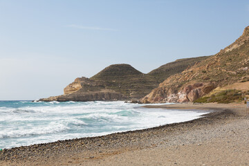 Fototapeta na wymiar Mediterranean sea, waves, sand, rocks and landscapes