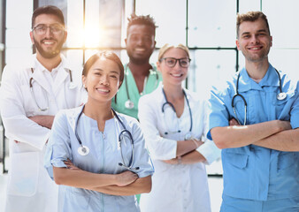 multinational group of doctors and interns standing together.