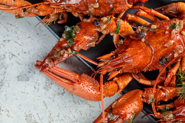 Table with cooked crayfish
