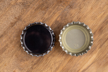 Black cap of beer bottle in selective focus.