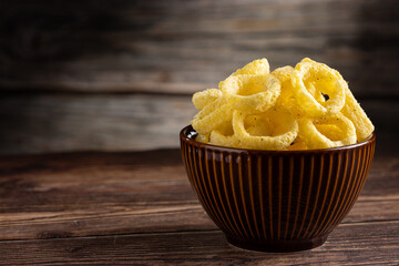 Puff corn rings in the bowl.
