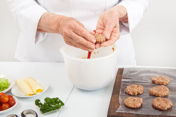 Step by step preparation of mini burgers. Homemade mini burgers for children or appetizers. Small hamburgers.