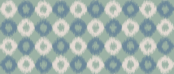 Seamless pastel ikat pattern. Ethnic diamond repeating background. Ornamental tribal fabric and textile swatch print design. Vector light blue asian folk abstract wallpaper