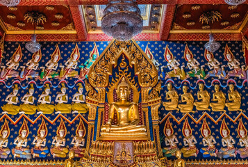 Fototapeta na wymiar Colorful Buddha Main Hall Wat That Temple Sanarun Bangkok Thailand