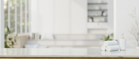 Copy space on a white tabletop with a blurred white elegance bathroom background.