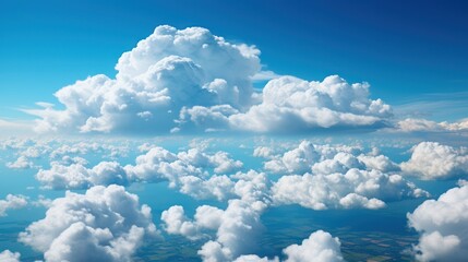 Naklejka na ściany i meble A group of clouds against the blue sky. 