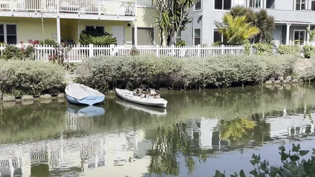 canal with boat and kayak docketing