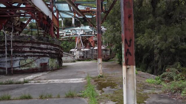 Drone flight travelling inside the ruins of the old cable car station El Liron, located in San Antonio de Galipan, Venezuela