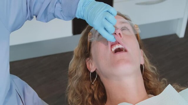 Dentist inject Infraorbital nerve block local anesthesia to patient