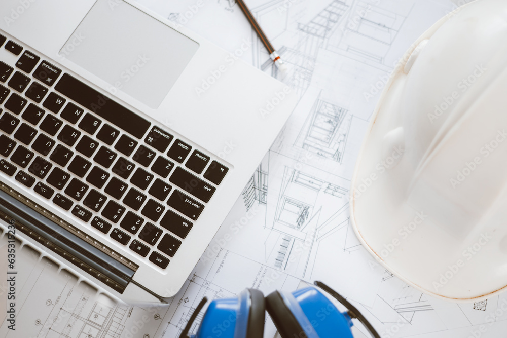 Poster architecture engineer working with blueprints and laptop in office. inspection in workplace for arch
