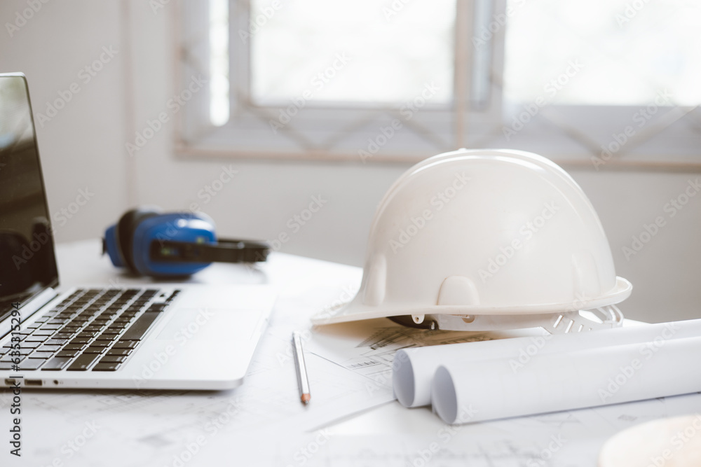 Poster architecture engineer working with blueprints and laptop in office. inspection in workplace for arch