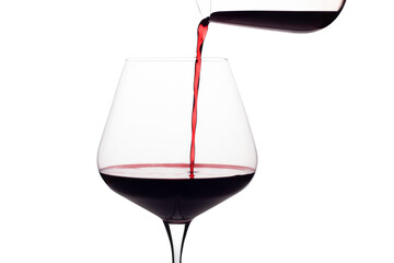 red wine pouring into glass