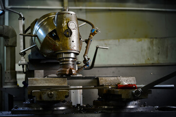 Vintage vertical turning mill used make detail in workshop