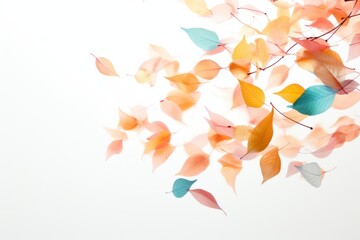 A cascade of colorful autumn leaves — yellow, pink, orange, red, and blue — gently descends against a pristine white background. The leaves, caught mid-fall, emanate a soft and dreamy atmosphere