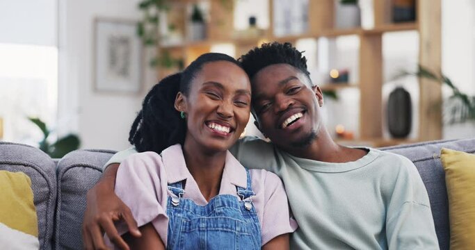 Black couple, hug and face with lounge with funny joke and laughing in a home. Love, marriage support and trust of happy portrait of young people together with romance in a house relax on a couch