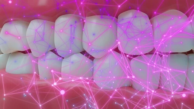 Pink glossy toothpaste structure on a demonstration denture.