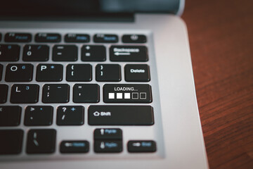 Businessman using smartphone and laptop uploading to cloud computing to download and loading data information and upload on system network application.
