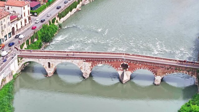 Arch bridge Ponte Pietra Adige river Verona Italy aerial