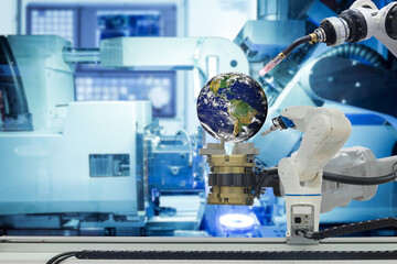 Close-up industrial gripping and welding robotic machinery working with Globe Earth to upgrade a new Globe with high technology on smart factory, concept idea, Element of this furnished by NASA