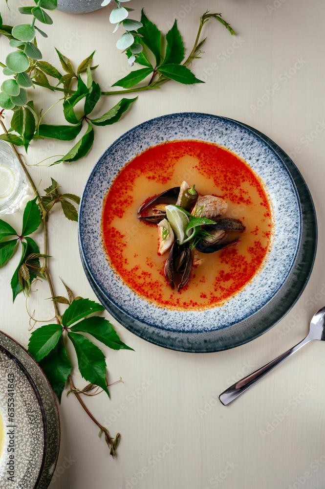 Wall mural asian tom yam soup with shrimp and mussels. restaurant menu