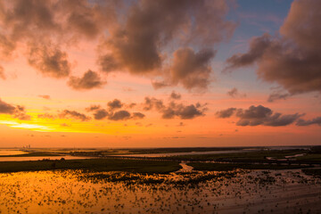 Fototapeta premium Beautiful sky at sunset over Mobile Bay, Alabama