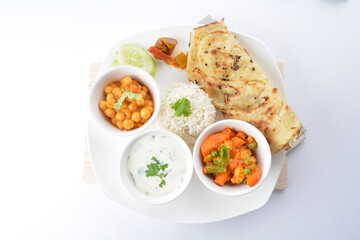 indian baked roti prata canai 2 pieces with spicy chilli curry chicken gravy soup sauce in plate on white background asian halal food cuisine menu for cafe design