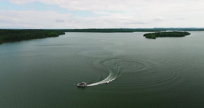 Motorboats Sailing On Tranquil Water Of Percy Priest Lake In Long Hunter State Park In Tennessee, United States. Aerial Wide Shot