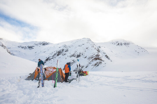 Skiers at basecamp after a day of backcountry skiing