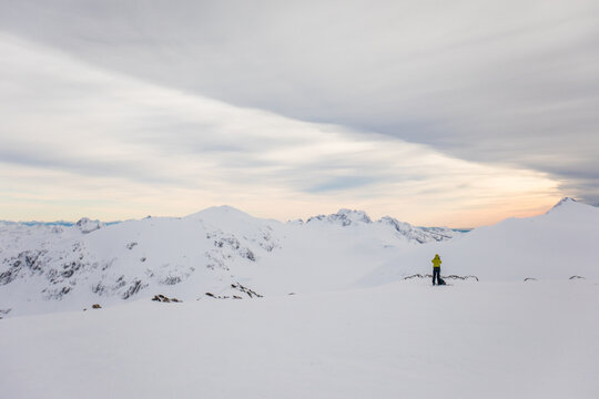 Single person looks out a mountain view in B.C. Canada